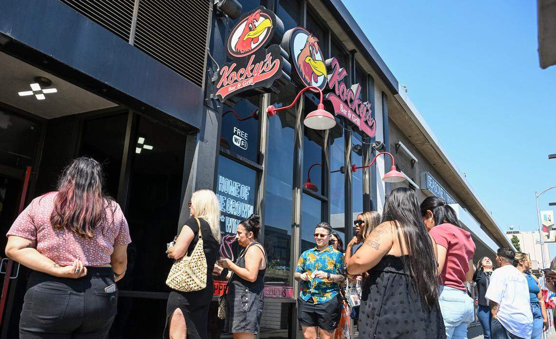 Brunch-goers wait to enter Kocky's Bar & Grill in downtown Fresno for their Butta Brunch on Sunday morning, Aug. 10, 2025.