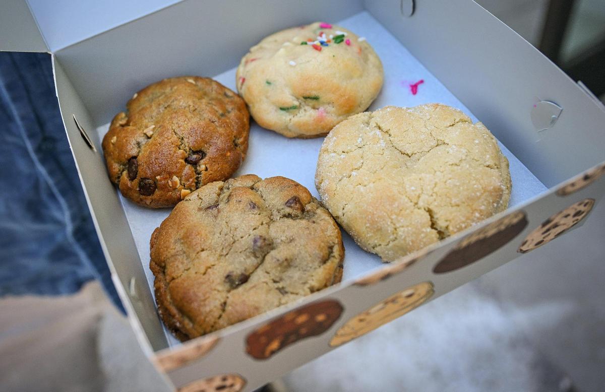A selection of gooey gourmet treats is displayed from Dads Cookies, a Fresno business started by Lance Sanchez during the pandemic and will now set up a brick-and-mortar location at The Garage, a new retail space in downtown Fresno.