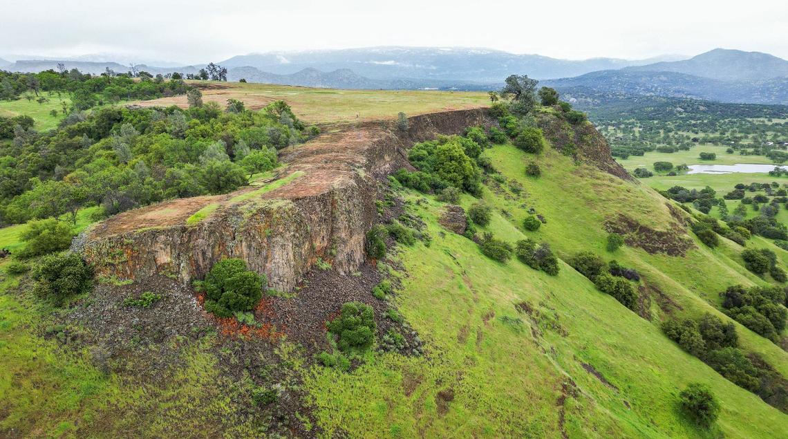 The top of a table mountain comes into view in this drone images taken on Sunday, April 14, 2024 during a hike on the McKenzie Table Mountain Preserve in Fresno County through the Sierra Foothill Conservancy.