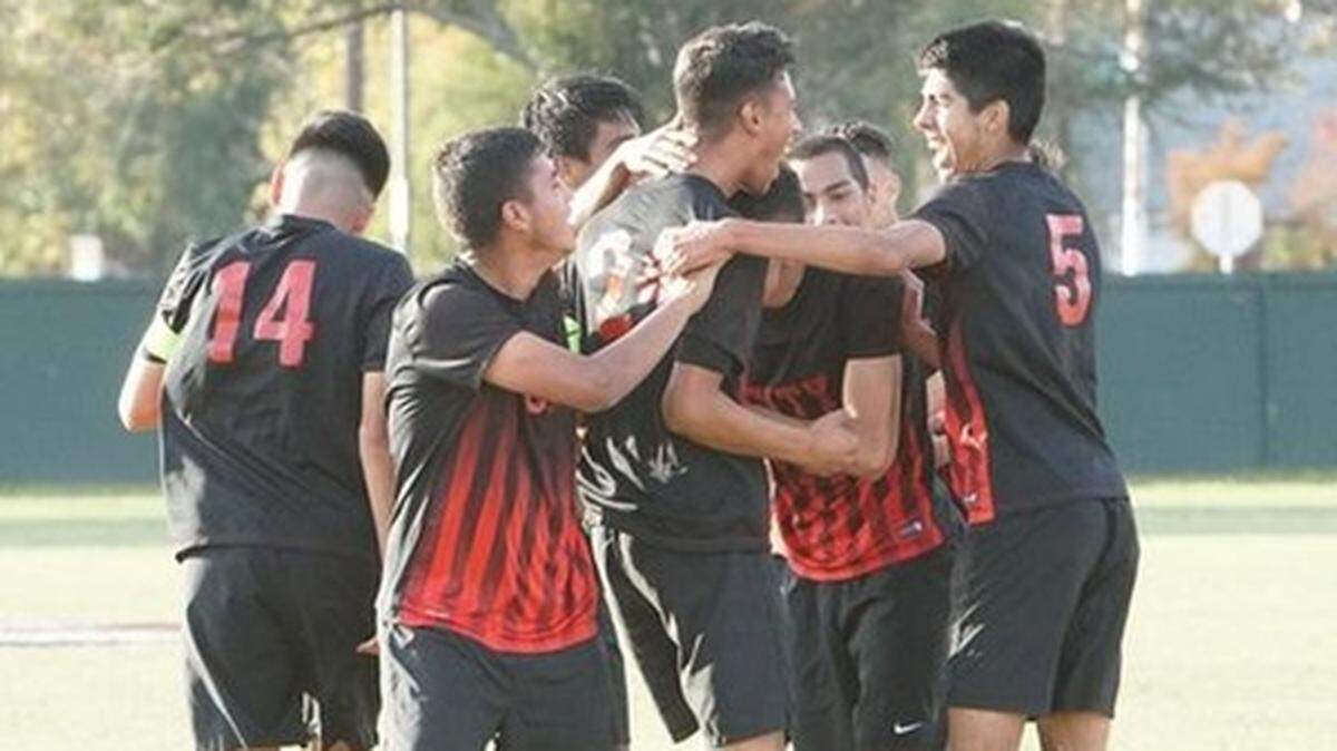 The Fresno City College men’s soccer team, celebrating an earlier victory, clinched the program’s second state championship with a 2-0 victory over Mt. San Antonio on Sunday, Dec. 8, 2019 in Cupertino.