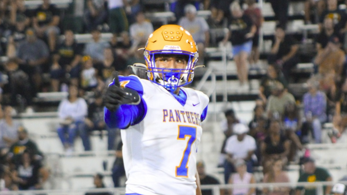 Lorenso Sanchez, seen in an undated photo playing football for Corcoran High School, was killed in a stabbing at the Hanford Mall on April 26, 2025.