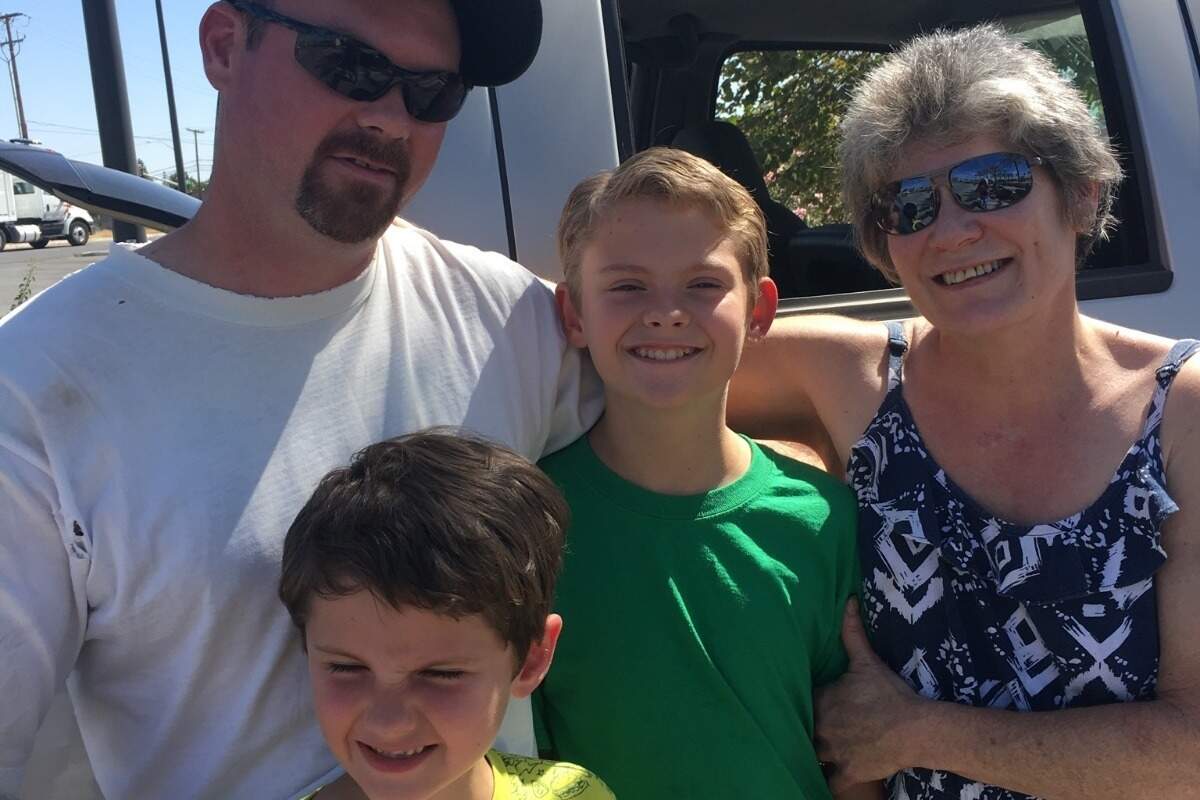 From left: Jacob Telnas and his two sons Jacob Ray and Jackson with their grandmother Diana.