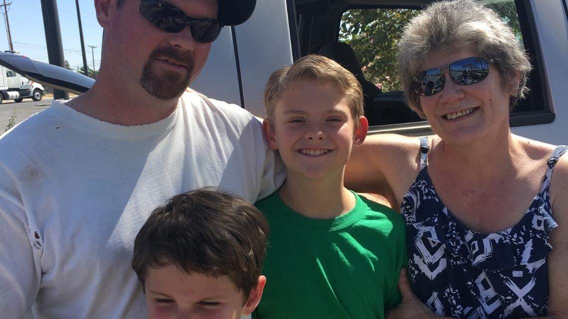 From left: Jacob Telnas and his two sons Jacob Ray and Jackson with their grandmother Diana.