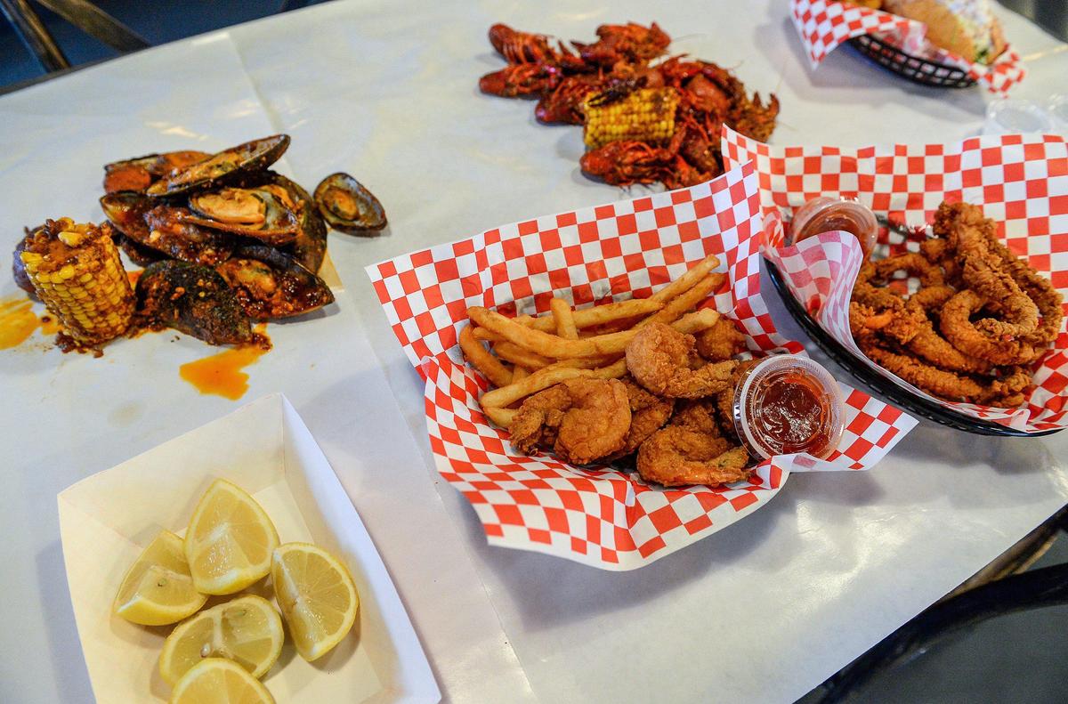 Various steamed, boiled and fried seafood served right on the table at Cajun Crack’n, a new restaurant that that opened in the former Hooters near Riverpark. It’s a seafood in a bag place that ecourages customers to get messy and enjoy the experiece.