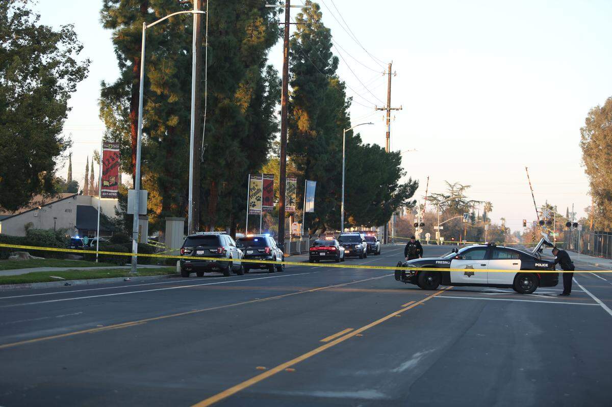 Fresno police officers shut down North Fruit Avenue at Ashlan and Dakota avenues on Monday afternoon to investigate a shooting.