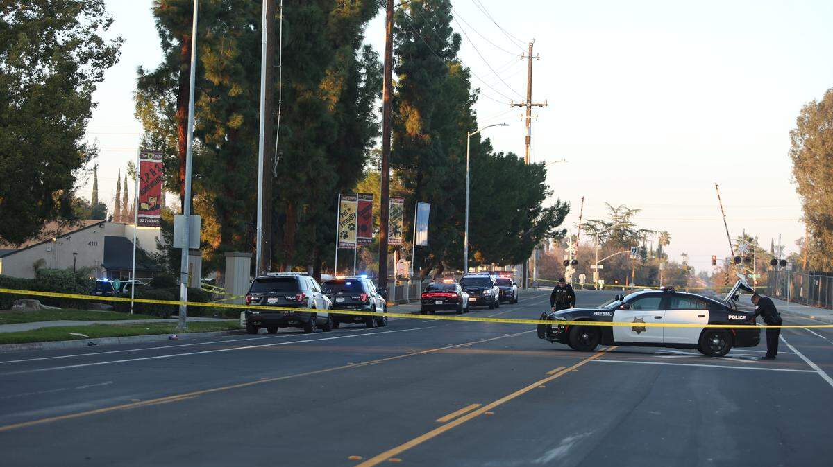 Fresno police officers shut down North Fruit Avenue at Ashlan and Dakota avenues on Monday afternoon to investigate a shooting.