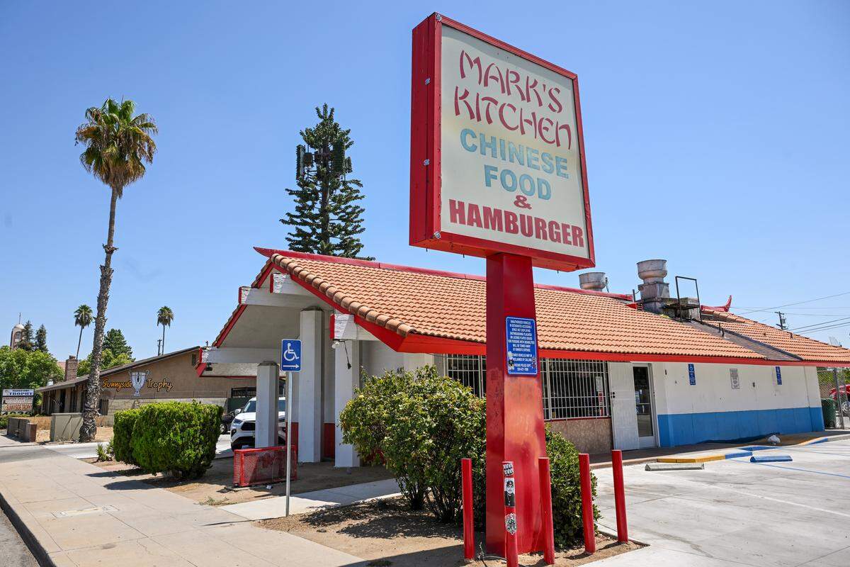 Mark's Kitchen is a Chinese food restaurant with hamburgers on its menu and is located on Belmont east of Chestnut. 