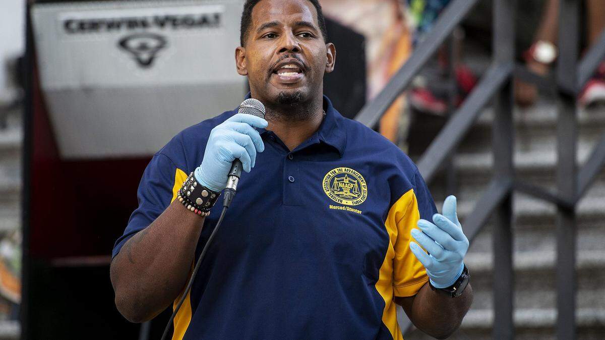 Allen Brooks is shown speaking during a candlelight vigil in memory of George Floyd in 2020. Brooks was recently elected as the new Area 3 trustee for Merced City School District.