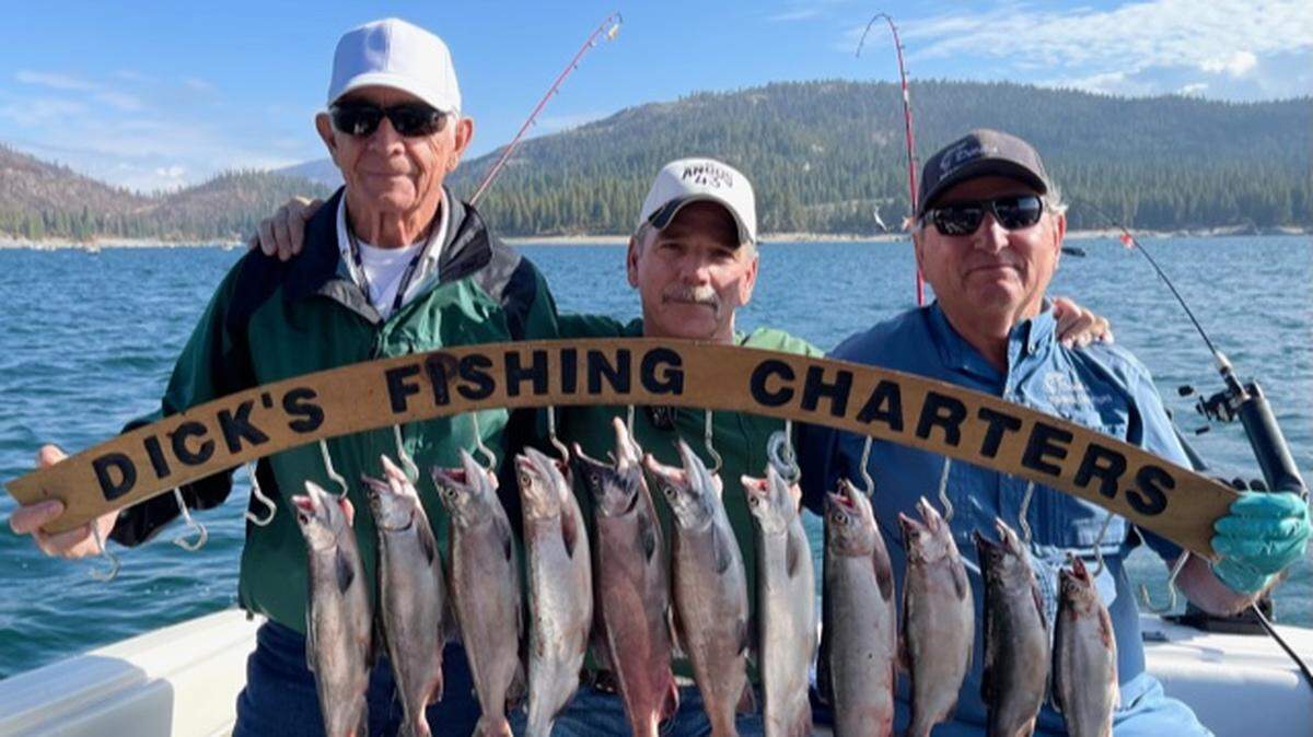 Bill Burgen Sr. and son Billy Burgen with guide Dick Nichols show off their limits at the end of Nichols’ last guide trip Sept. 10 at Shaver Lake.