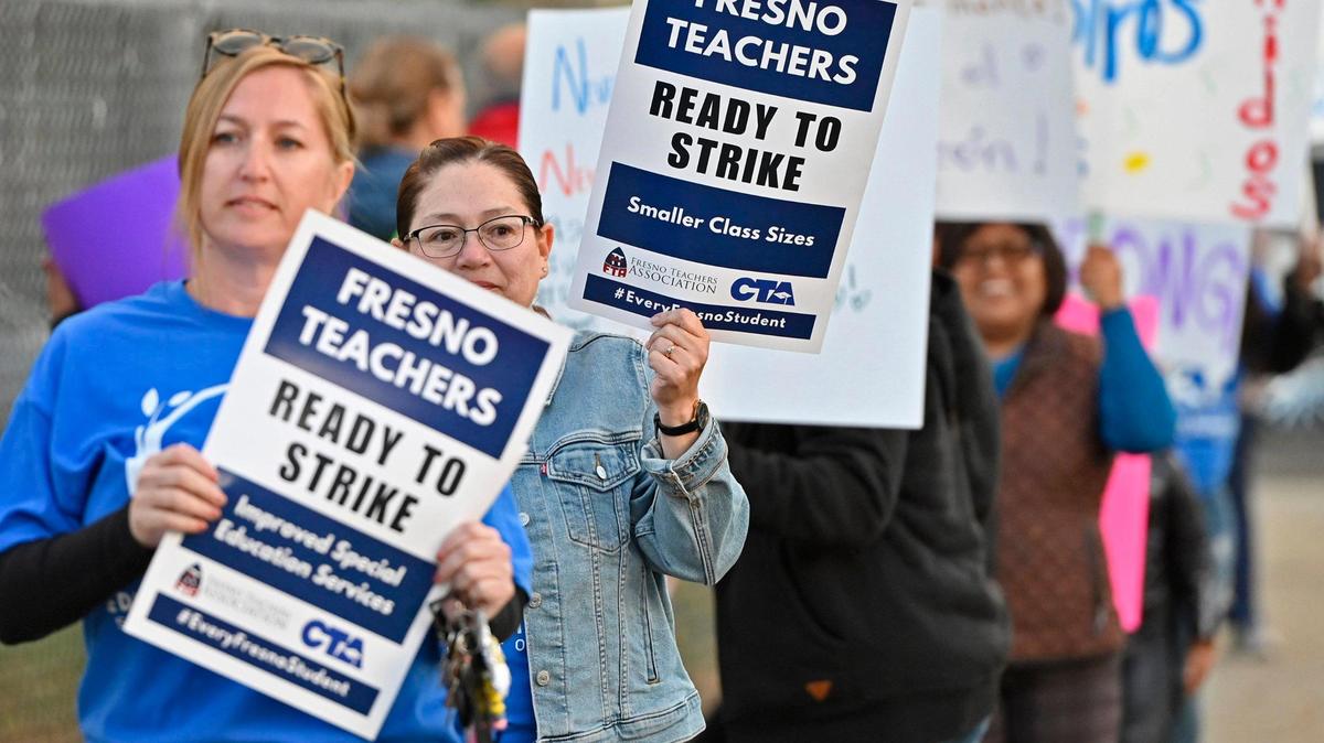 Teachers strike in front of Winchell Elementary School in south Fresno as part of FTA’s Day of Action Friday morning, Oct. 27, 2023 in Fresno.