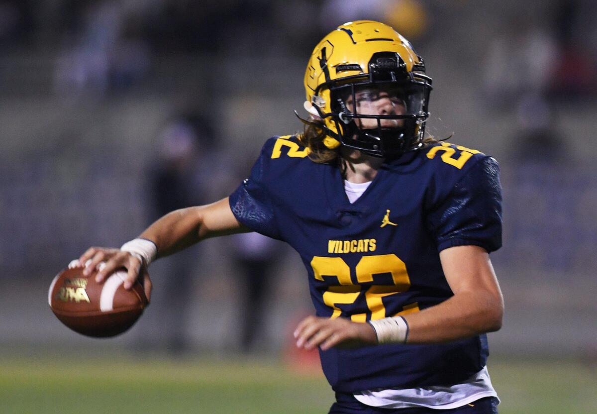 Sunnyside quarterback Tanner Wilson looks to pass downfield against Reedley Thursday, Oct. 28, 2021 in Fresno.