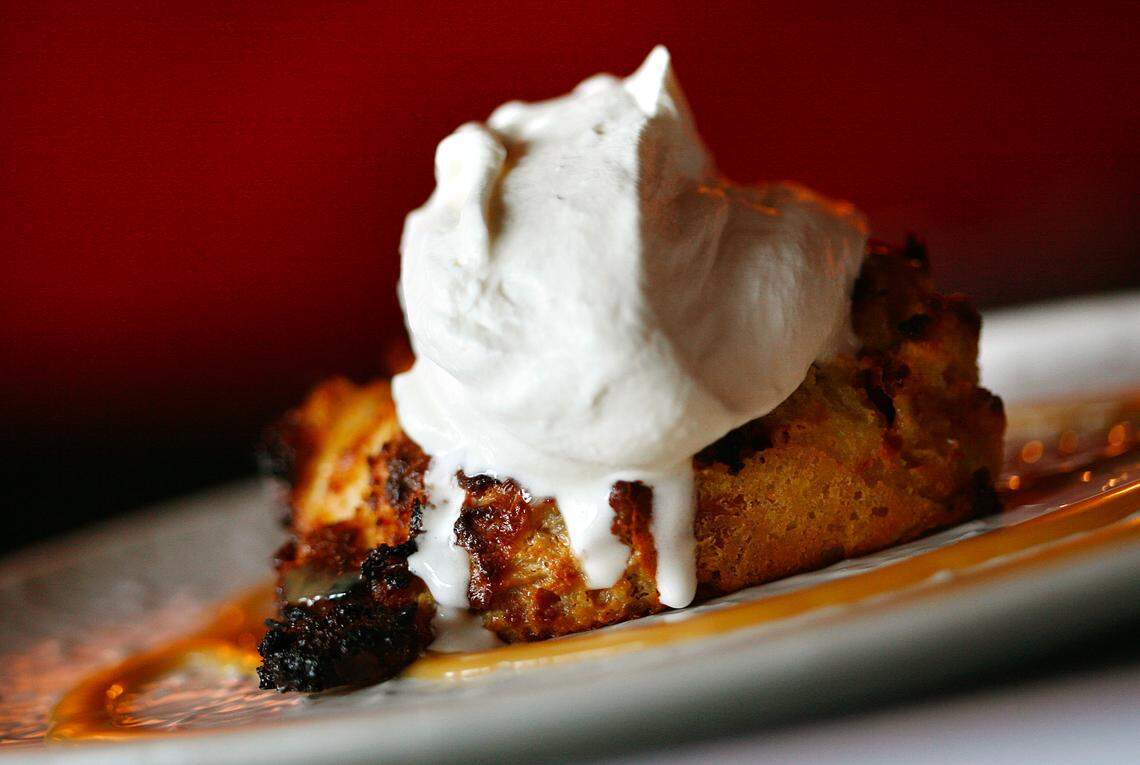 Bread pudding at the Cracked Pepper Bistro is plated with caramel and whipped cream in this file photo.