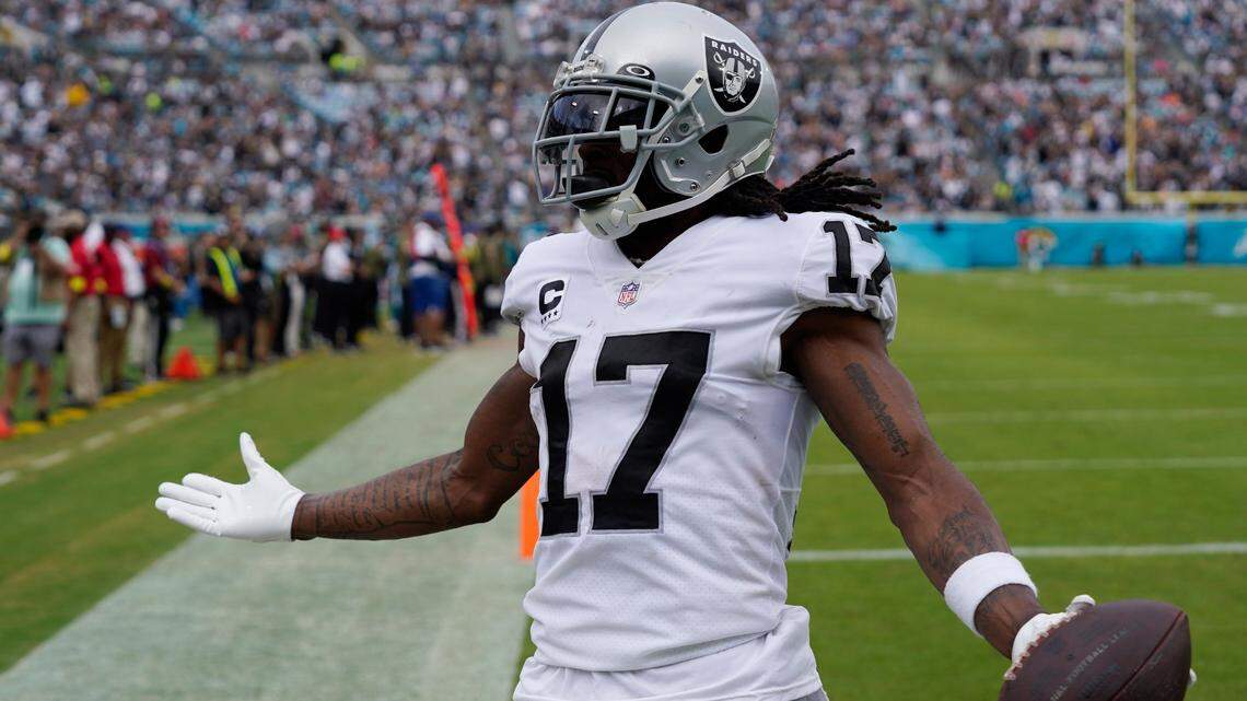 Las Vegas Raiders wide receiver Davante Adams celebrates after scoring his second touchdown of the game on a 38-yard pass against the Jacksonville Jaguars in the first half of an NFL game Sunday, Nov. 6, 2022, in Jacksonville, Fla.