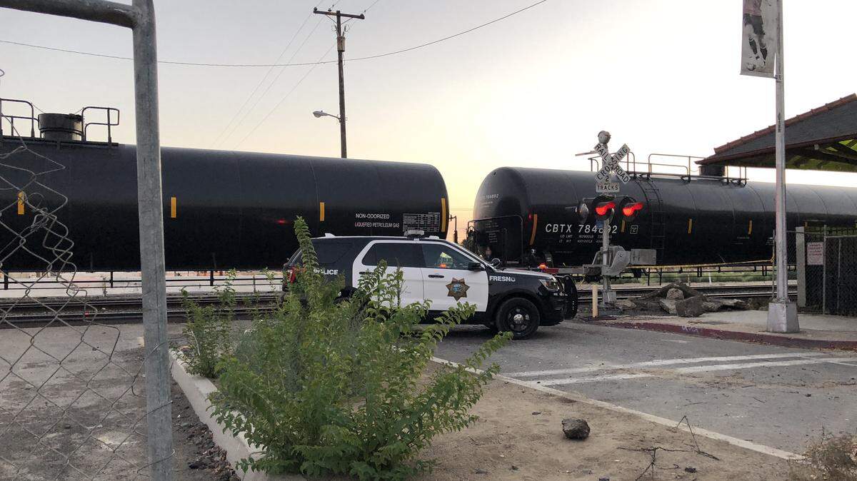 Fresno police at Tulare and H streets in downtown where a pedestrian was hit and killed by a train Tuesday evening, July 3, 2018.