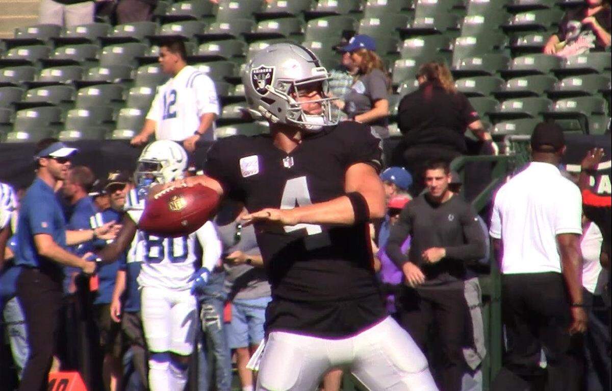 Oakland Raiders quarterback Derek Carr during warmups on Oct. 28, 2018 against the Indianapolis Colts.