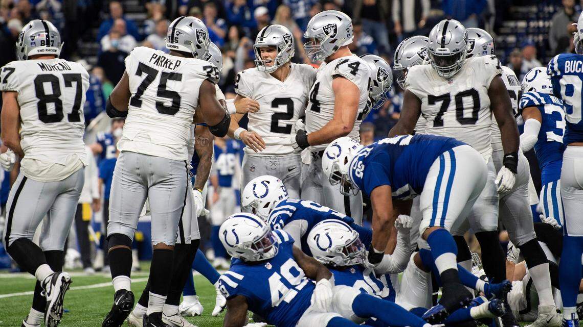 Las Vegas Raiders kicker Daniel Carlson celebrates after kicking the winning field goal against the Indianapolis Colts on Sunday, Jan. 2, 2022, in Indianapolis.