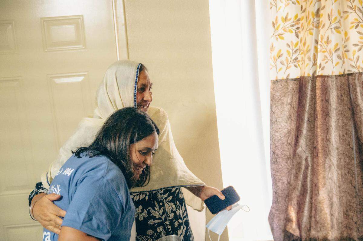 Kulwant Kaur of Fresno hugs Mandip Kaur, the Jakara Movement’s Health Program manager, who was visiting her apartment complex. Kaur, 62, said Jakara helped her obtain rental and food assistance after her husband died.