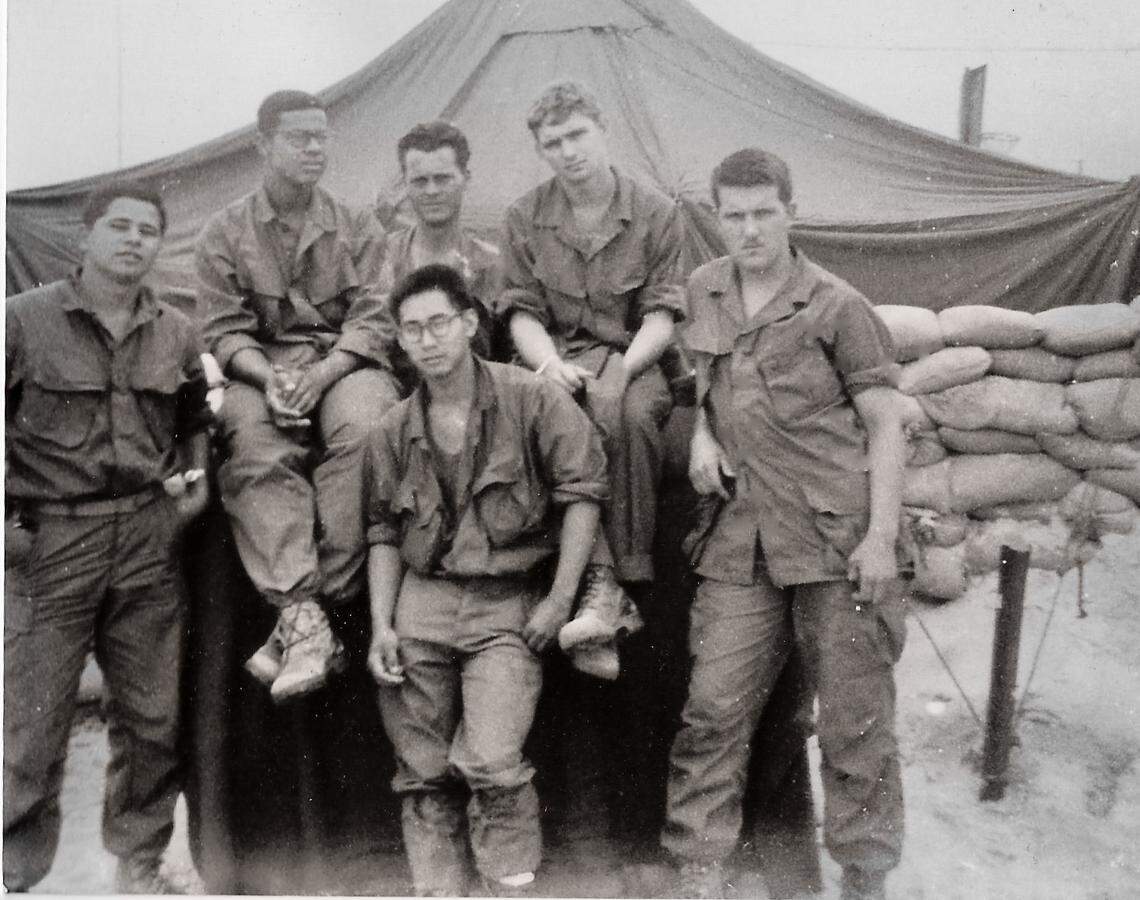 A group of Vietnam War veterans are looking for Al Lopez, who lived in Fresno, pictured far left, January of 1968. Four Marines, including Mike Duerr, pictured far right, will return to Vietnam to return a stolen Buddha statue.