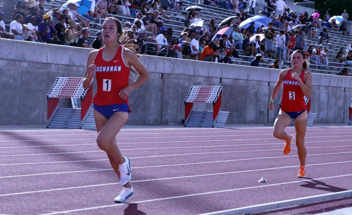 Buchanan High senior Sierra Cornett (4:52.96) and freshman Brooklyn Buckley (4:53.56) finished 1-2 in the girls 1,600-meter race at the CIF Central Section Masters Track and Field Championships at Buchanan High’s Veterans Memorial Stadium on May 24, 2025.