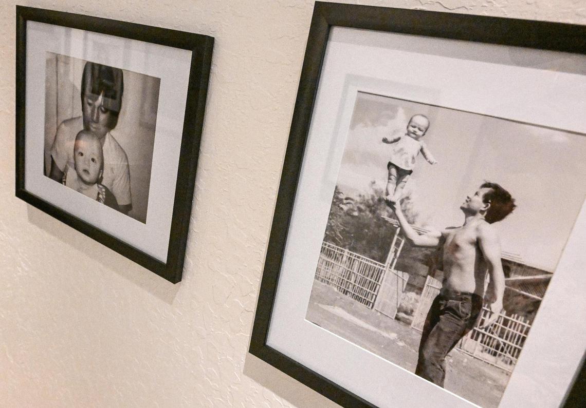 Family photos line the wall along the hallway at Love & Thai which is having a soft opening in the shopping center at South Chestnut and East Butler avenues in southeast Fresno.