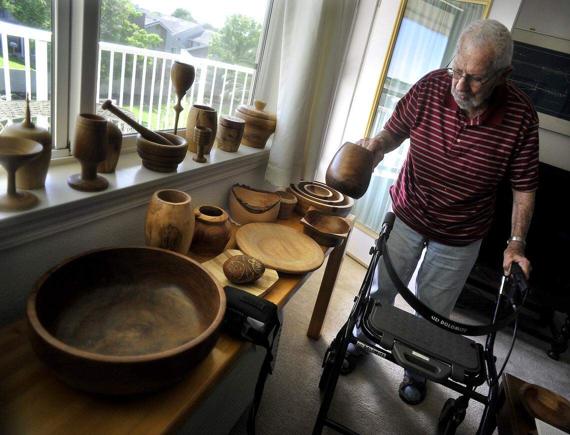 Jack Schwartz with a collection of his woodworking at his Hanford home in 2015.