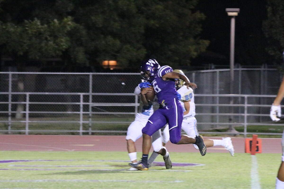 Running back Decurtis Stroud gains yards for Washington Union against Monache on Friday.