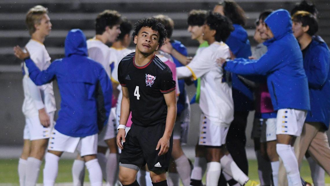 McLane’s Daniel Contreras is seen as Terra Linda celebrates its 2-0 win, backgrouhd, in the CIF Northern California Regional Division III boys soccer championship Saturday, March 4, 2023 in Fresno.