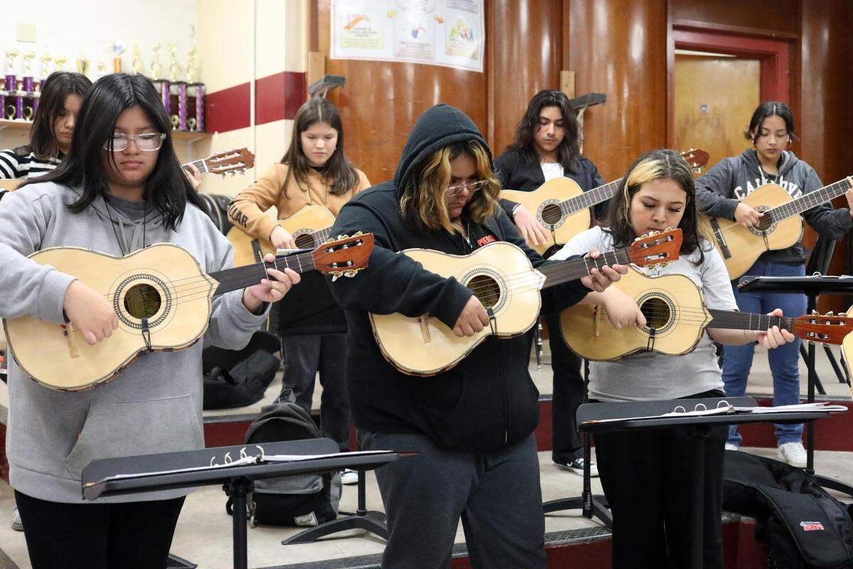 Orosi High School Mariachi Cardenal members during their mariachi class on Wednesday, March 15, 2023.