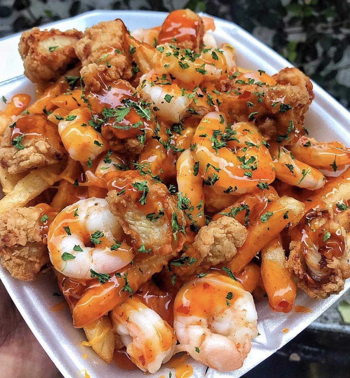 French fries loaded with toppings are the main menu item at Mr. Fries Man, which plans to open its first Fresno location this summer. Pictured here are fries topped with fried chicken, shrimp and honey-garlic sauce.