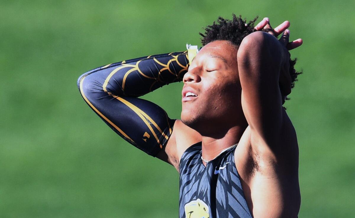 Caleb Johnson from Clovis reacts to a bad jump at the Boys High Jump at the CIF State Track and Field Championship finals Saturday, May 28, 2022 in Clovis.