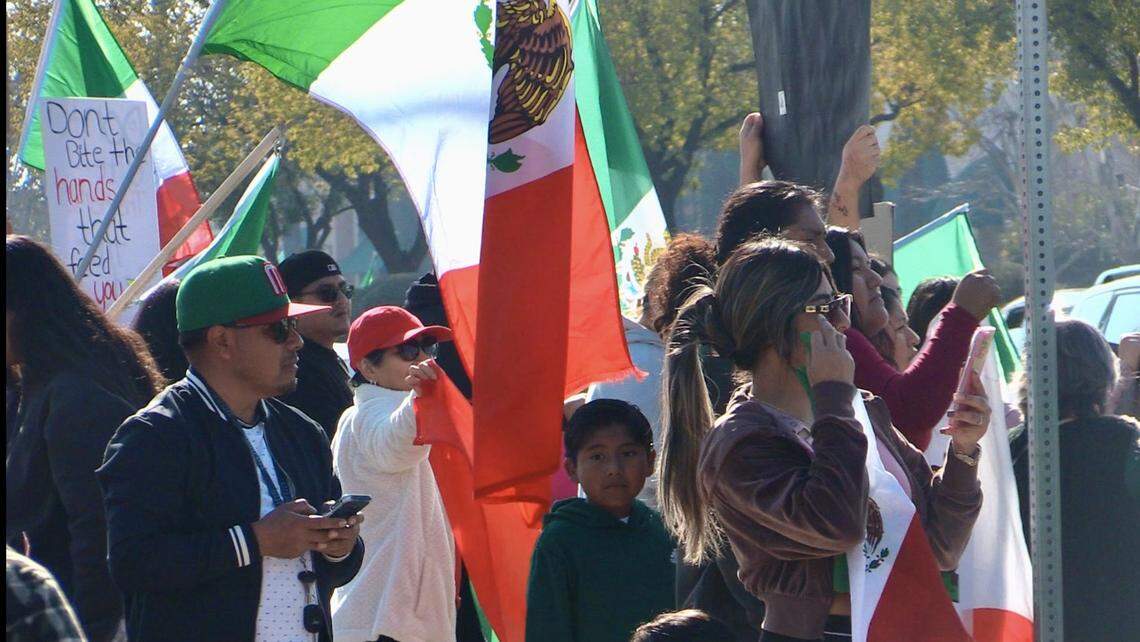 Demonstrators gather in Fresno, California on Sunday, Jan. 12, 2025, over the raid in Kern County this past week.