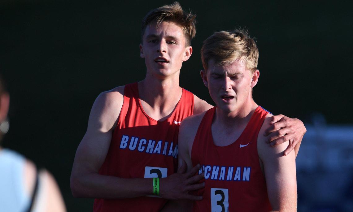 Noah Ray, left, who took first place in the 800, consoles Zach Weaver, right, who was disqualified at the Central Section Masters held at Buchanan High School Saturday, May 21, 2022 in Clovis.