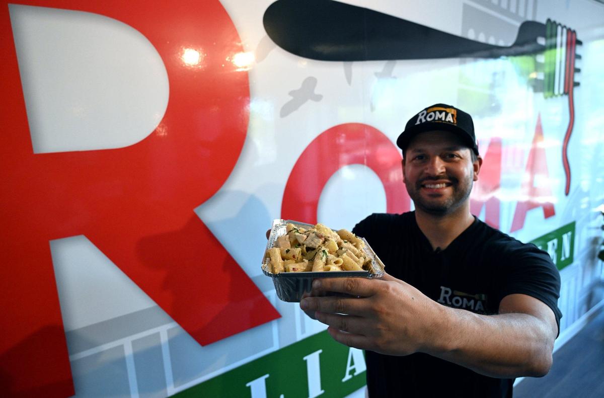 Andrew DiNuzzo has moved beyond his food truck to open Roma’s Italian Kitchen at Shepherd and Chestnut avenues, specializing in fast-casual Italian food. He’s pictured here with the RCBA, the rigatoni, chicken, bacon and Alfredo sauce pasta.