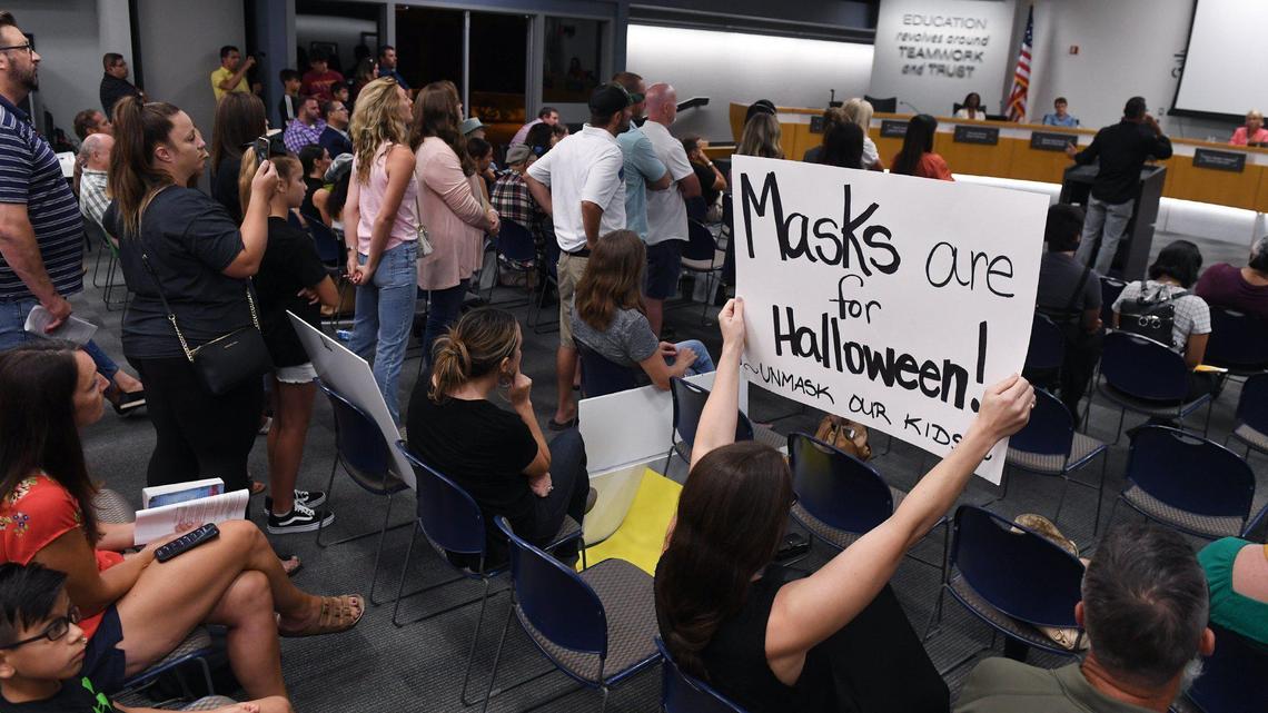 Around 40 people stood in line to voice their opinion against mask-wearing at the Clovis Unified School Board meeting Wednesday night, July 21, 2021 in Clovis.