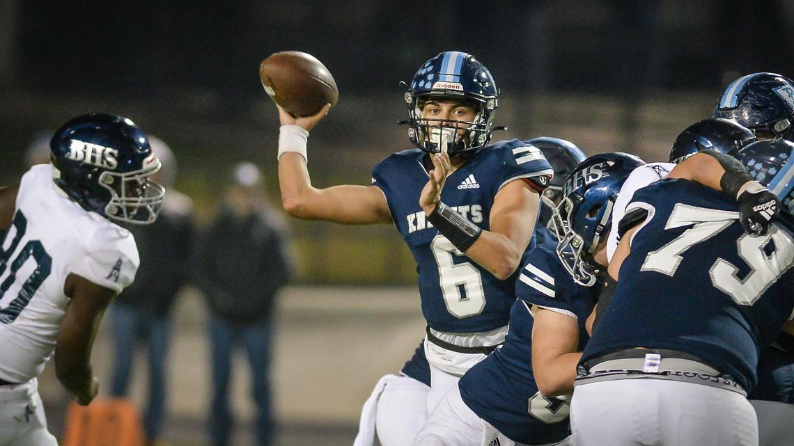 Bullard quarterback Roland Russo looks to throw downfield against Bakersfield during their Central Section Division II football championship game held at McLane Stadium on Friday, Nov. 26, 2021.