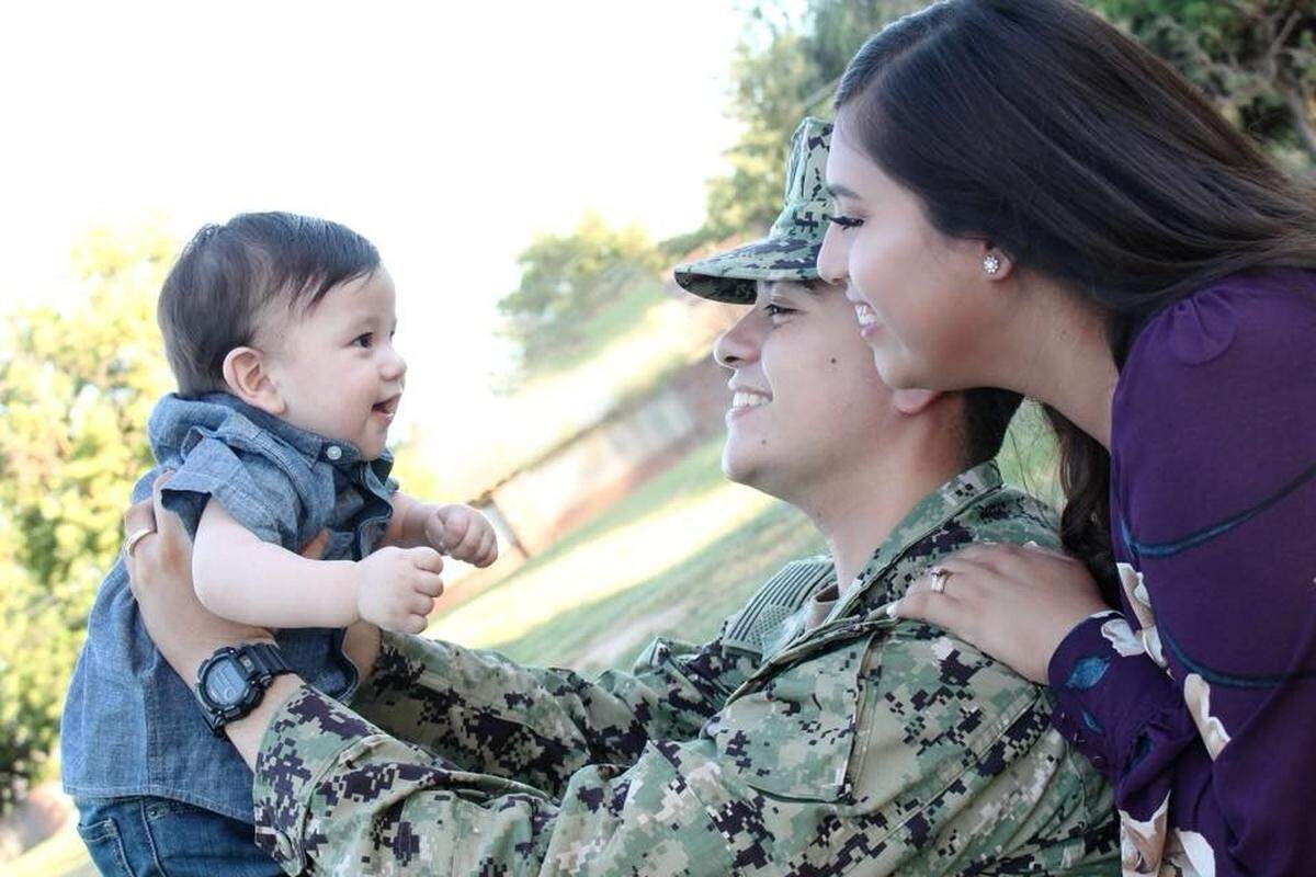 A photo of U.S. Navy Master-at-Arms 3rd Class Oscar Temores with his wife, Bethany Temores, and their son, Damien, posted on a GoFundMe donation account to help their family.