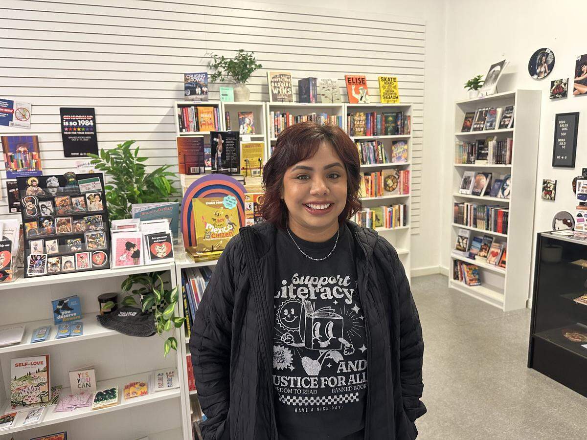 Ashley Mireles-Guerrero is seen inside the Judging by the Cover bookstore in Fresno’s Chinatown on Thursday, Feb. 12, 2026. Mireles-Guerrero owns the bookstore with her husband, Carlos Guerrero.