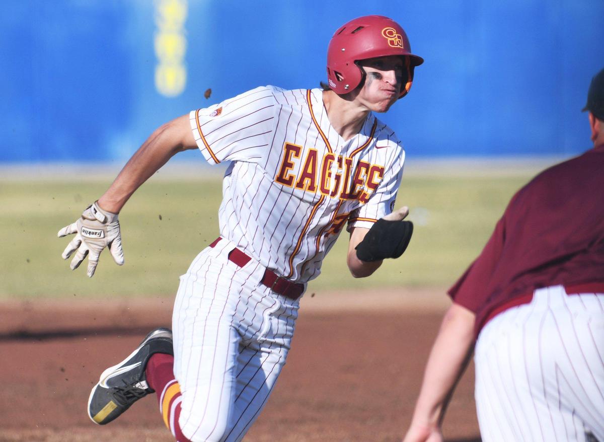 Clovis West’s Nathan Baeza rounds third base in Coca Cola Classic baseball championship action against San Joaquin Memorial Saturday, March 12, 2022 in Clovis. Clovis West ended the game defeating Memorial 9-2 for the championship.