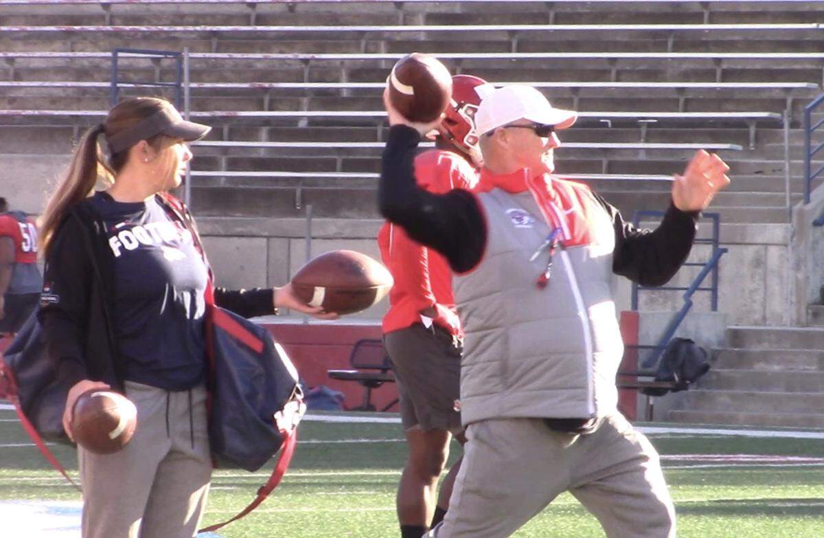 Fresno State football coach took part in throwing to wide receivers on Friday, March 15, 2019.