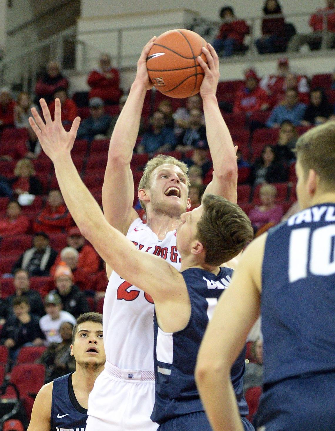 Fresno State’s Sam Bittner goes up for a shot against Utah State in an 82-81 loss to the Aggies at the Save Mart Center in Fresno on Tuesday, Feb. 5, 2019. Bittner scored 13 points with three rebounds and two assists.