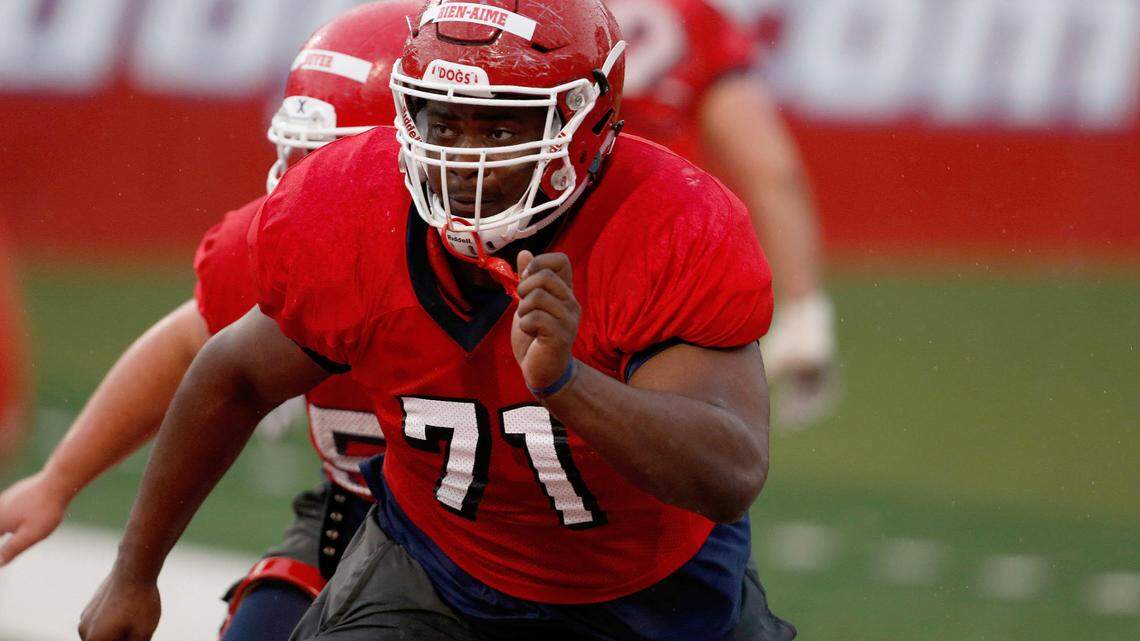 Fresno State offensive lineman Marc-David Bien-Amie works a drill in 2018. Bien-Amie, who grew up in Haiti and survived the catastrophic 2010 earthquake, will graduate on Saturday, May 15, 2021 with a degree in sociology.
