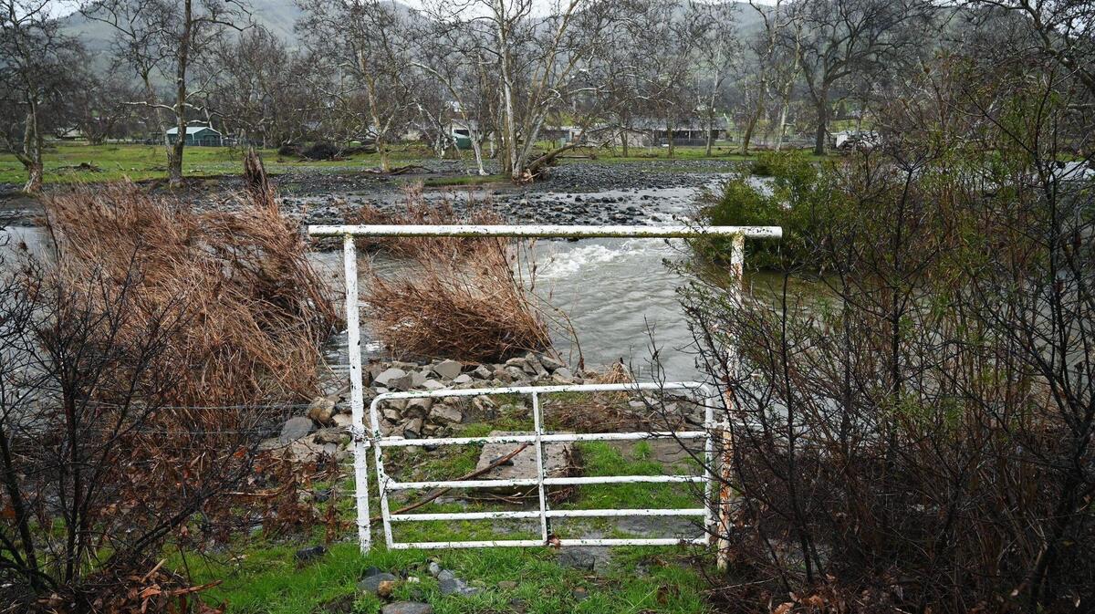 Mill Creek flows behind Wonder Valley Ranch Resort as an atmospheric river expected to dump over 3 inches of rain through the weekend approaches the area on Thursday, March 9, 2023 east of Fresno.