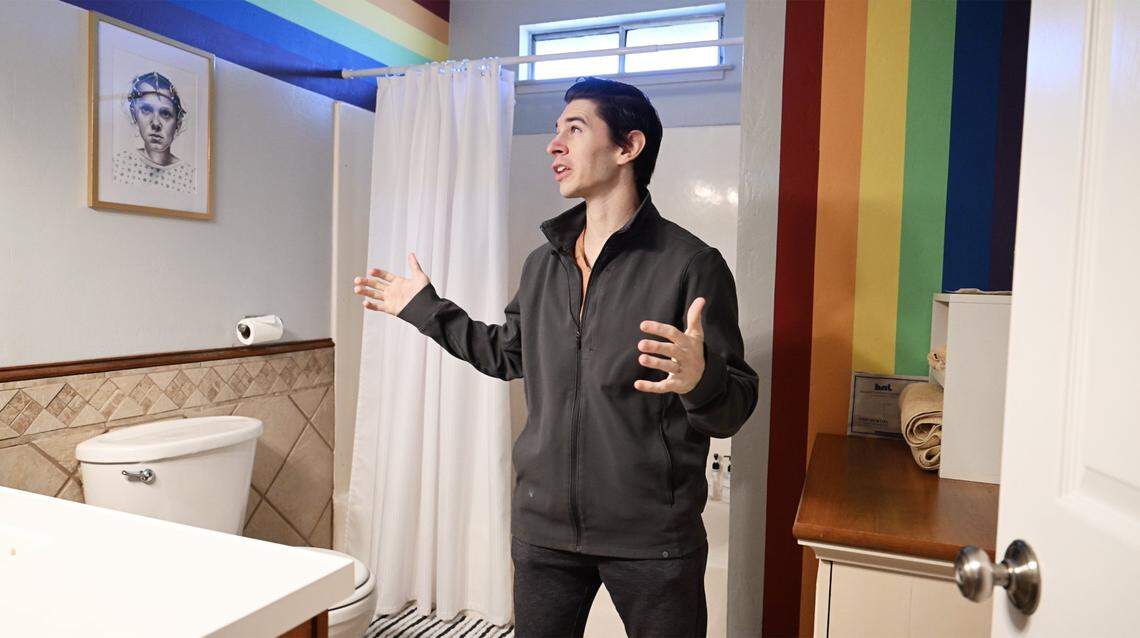 Chris Lofing shows The Rainbow Room-themed bathroom at his Airbnb house with a Stranger Things theme in Clovis. Photographed Tuesday, Jan. 13, 2026 in Clovis.