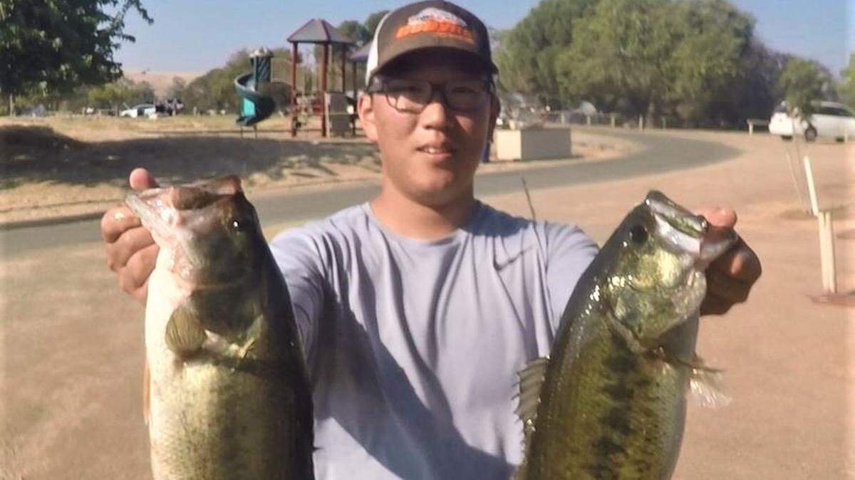 Joey Yang shows off part of the winning catch in the Christian Bass League tournament Oct. 17 at Lake Tulloch. Yang and his father, Jun Yang, totaled 13.24 pounds. Sergio and Nathan Molina were second with 12.94 and Jeff Sorensen and Howard Mori were third with 111.80 including the big fish of 5.22. Details: christianbassleague.com.