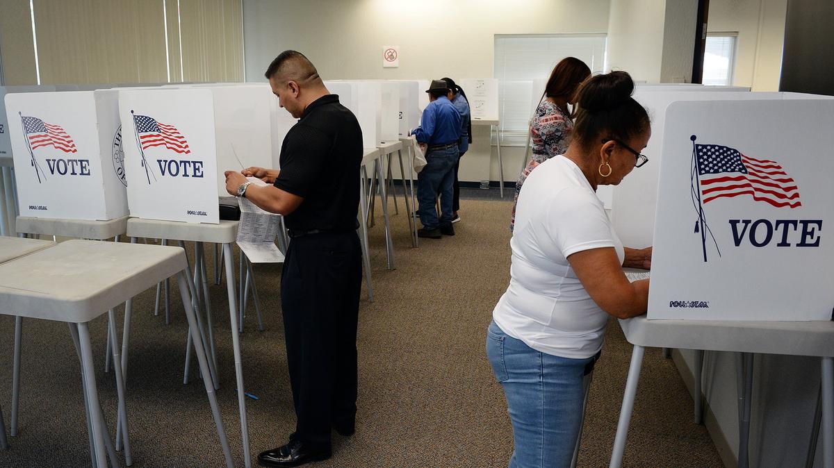 Voters turn out to vote in the California primary election at the Fresno County Registrar of Voters office in downtown Fresno on Tuesday, June 5, 2018.