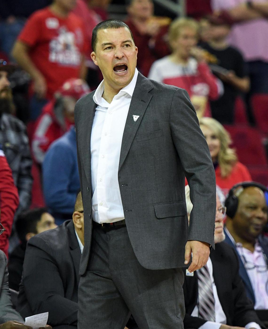 Fresno State coach Justin Hutson yells from the sideline Saturday. The Bulldogs lost 85-62 at Wyoming on Tuesday, their third loss in a row and their sixth in seven games. After, Hutson said, “We didn’t come ready to play. We had guys running around talking about they’ve got headaches and they’re not feeling good.”
