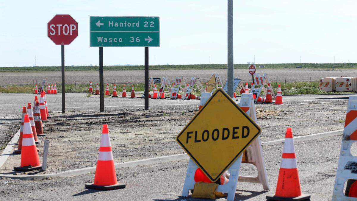 Highway 43 is closed to traffic at 4th Avenue near the City of Corcoran due to widespread flooding that is re-creating the old Tulare Lake. Photographed Thursday, April 6, 2023, south of Corcoran, California.