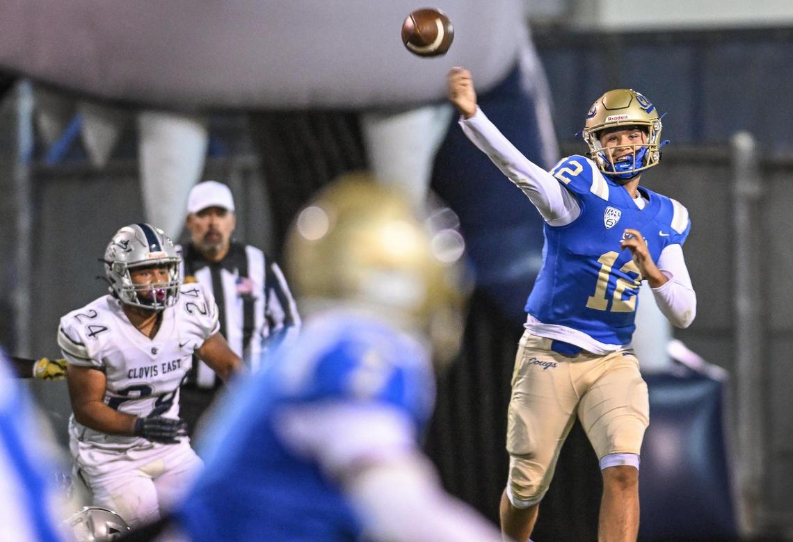 Clovis quarterback Deagan Rose throws downfield to an open receiver during their game against Clovis East at Lamonica Stadium on Friday, Oct. 18, 2024.