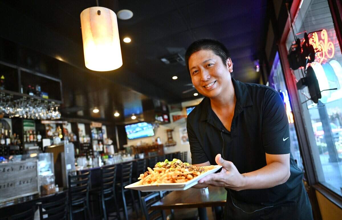 George Widjaja, owner of Little Leaf Bar & Restaurant, reflects on the fame winning best french fries has brought his fusion restaurant, bar and tea location at Palm and Bullard avenues. Photographed Wednesday, July 15, 2026 in Fresno.