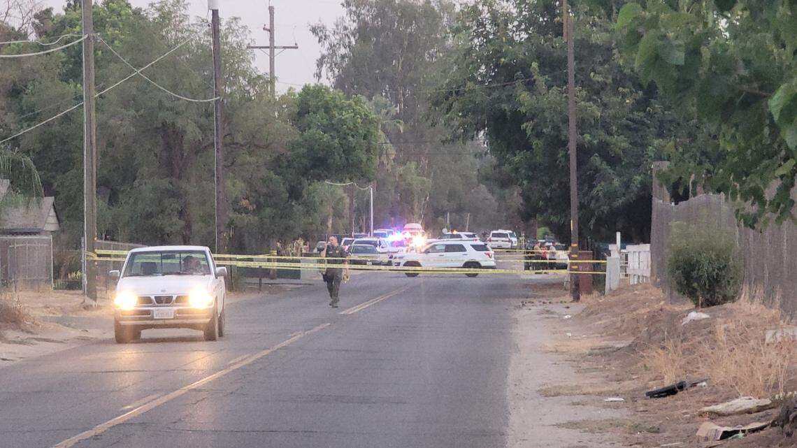 Law enforcement close off the scene after an officer-involved shooting involving a deputy with the Fresno County Sheriff’s Office in the 1100 block of North Valentine Avenue in Fresno, California, on Monday, Sept. 20, 2021.